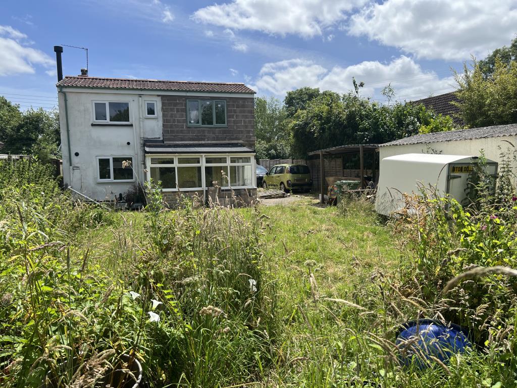Lot: 136 - DETACHED COTTAGE FOR COMPLETE REFURBISHMENT - General view of the rear of the property